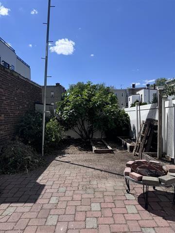 view of patio / terrace with a fire pit