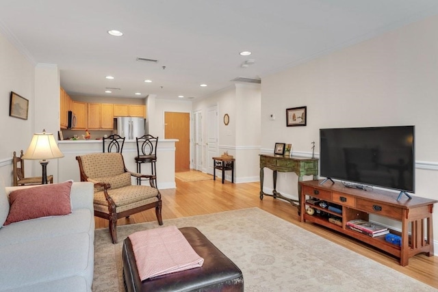 812 Grand St Unit 208, Hoboken, NJ 07030 - living area featuring light wood finished floors, recessed lighting, and crown molding