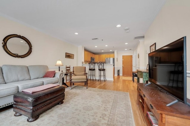 812 Grand St Unit 208, Hoboken, NJ 07030 - living room featuring ornamental molding, light wood-style flooring, and recessed lighting