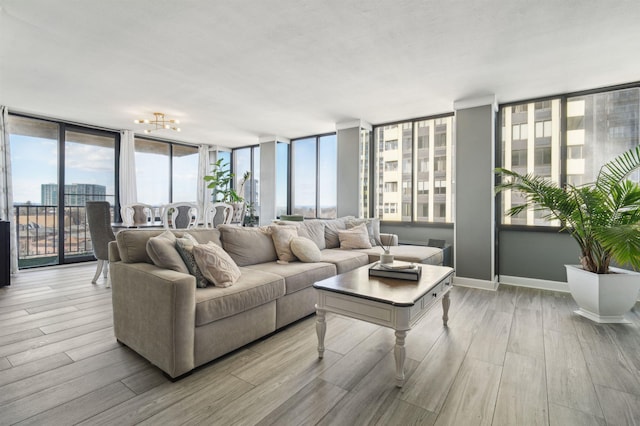 interior space featuring a city view, wood finished floors, and baseboards