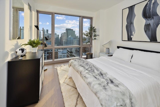 bedroom featuring hardwood / wood-style floors