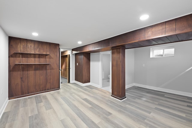 basement featuring light wood-type flooring