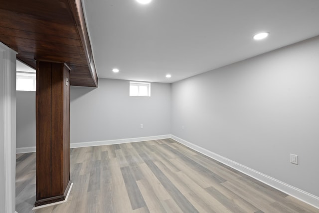 basement featuring light hardwood / wood-style flooring