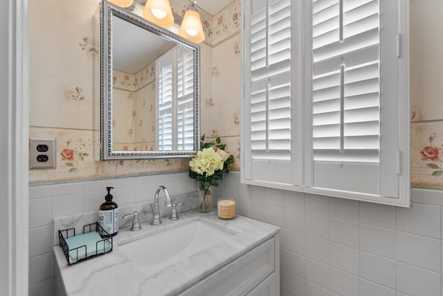 27 E 34th St, Bayonne, NJ 07002 - bathroom featuring vanity, a wainscoted wall, and tile walls