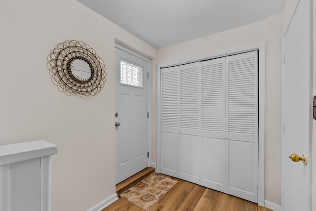 27 E 34th St, Bayonne, NJ 07002 - entryway featuring light wood-style floors and baseboards
