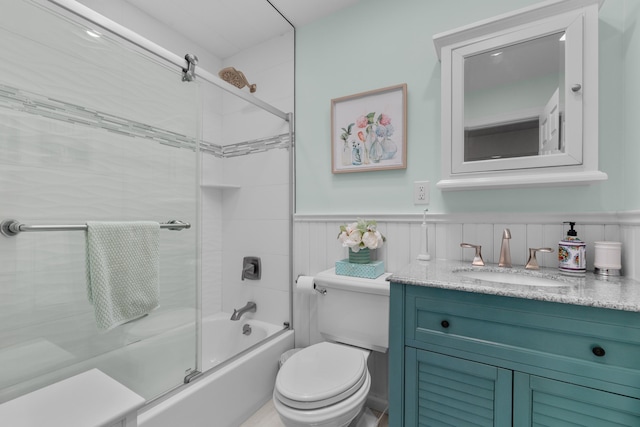27 E 34th St, Bayonne, NJ 07002 - bathroom featuring shower / bath combination with glass door, vanity, and wainscoting