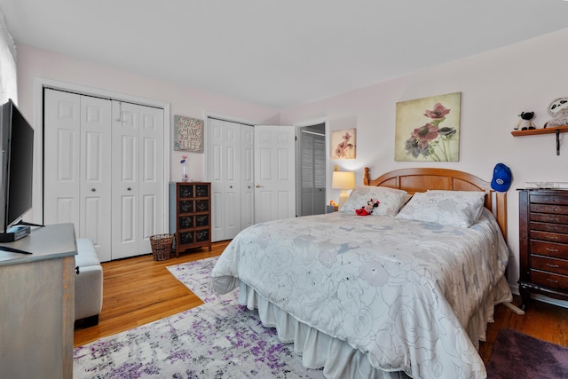 27 E 34th St, Bayonne, NJ 07002 - bedroom with wood finished floors and multiple closets