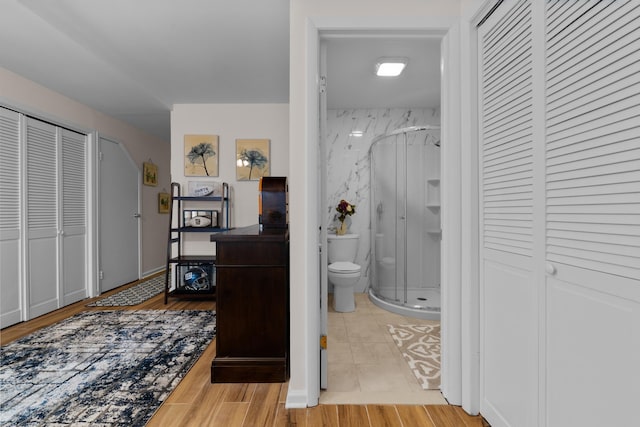 27 E 34th St, Bayonne, NJ 07002 - corridor with light wood-style flooring