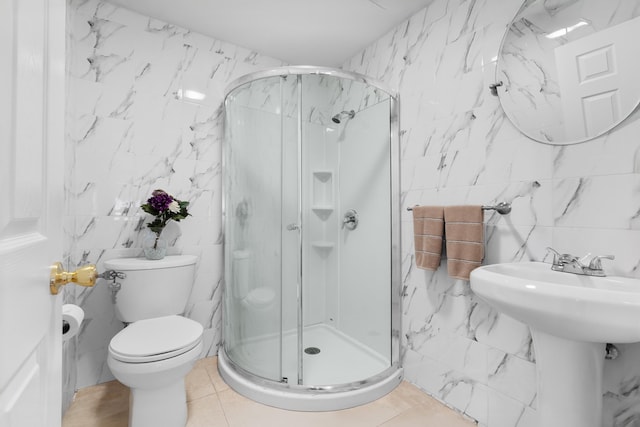 27 E 34th St, Bayonne, NJ 07002 - bathroom with tile walls, a stall shower, and tile patterned flooring