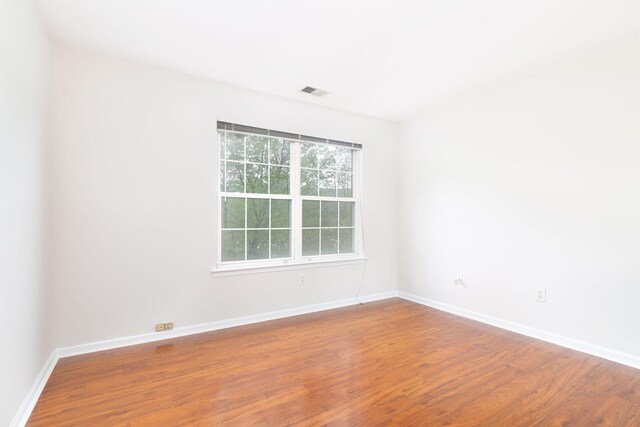 11 Crabapple Ct, Jersey City, NJ 07305 - spare room with wood finished floors and baseboards