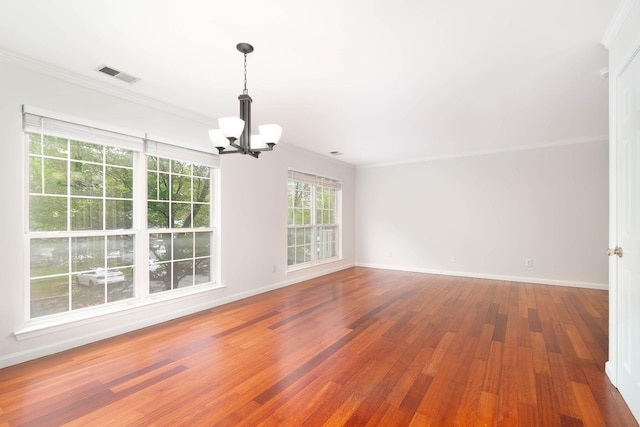 11 Crabapple Ct, Jersey City, NJ 07305 - empty room with a chandelier, wood-type flooring, and crown molding