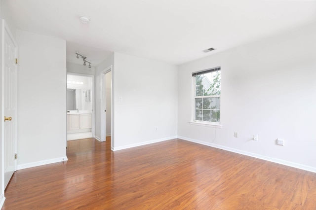 11 Crabapple Ct, Jersey City, NJ 07305 - unfurnished room with wood finished floors and a smoke detector