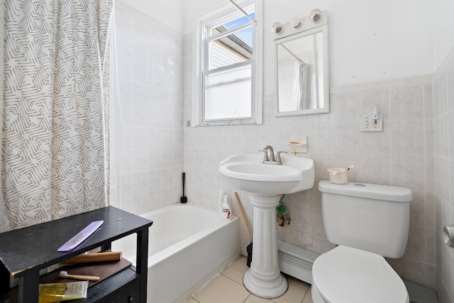 full bathroom featuring tile patterned flooring, toilet, a shower with shower curtain, tile walls, and a tub