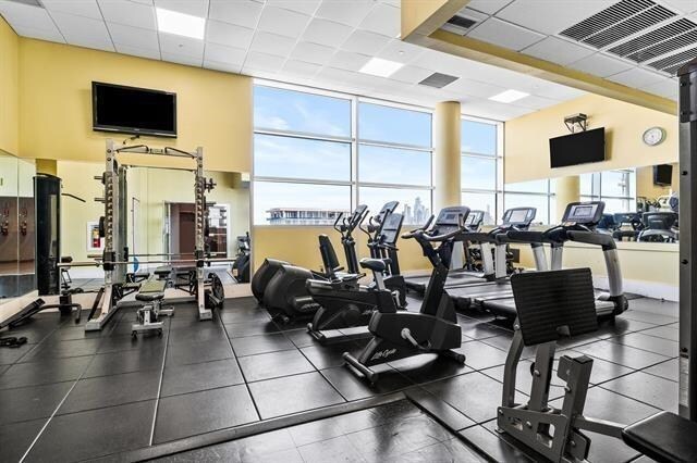 1 Shore Ln Unit 1805, Jersey City, NJ 07310 - workout area with a paneled ceiling