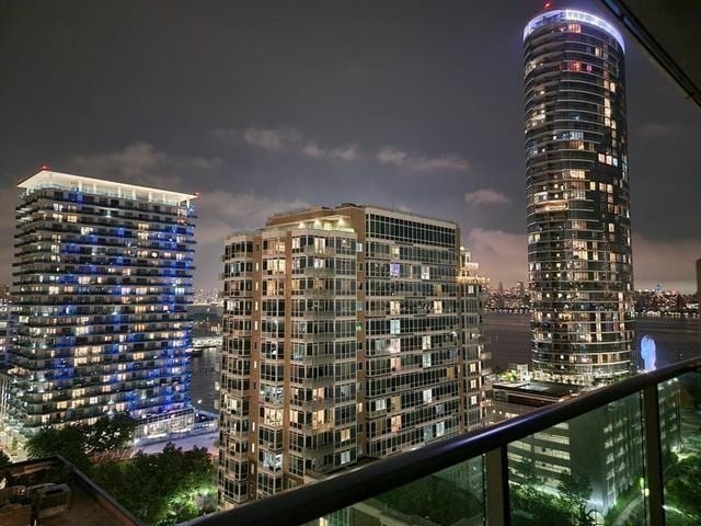 1 Shore Ln Unit 1805, Jersey City, NJ 07310 - property at night featuring a view of city lights