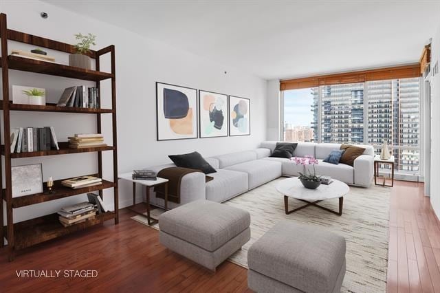 1 Shore Ln Unit 1805, Jersey City, NJ 07310 - living area with wood finished floors and a city view