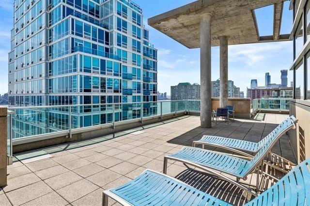 1 Shore Ln Unit 1805, Jersey City, NJ 07310 - view of patio / terrace featuring a city view