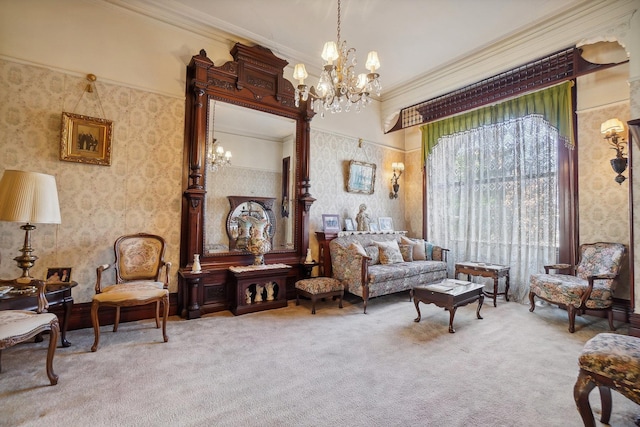 sitting room featuring wallpapered walls, ornamental molding, carpet, and a notable chandelier