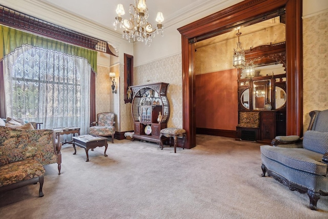 living area featuring ornamental molding, carpet, wallpapered walls, and an inviting chandelier