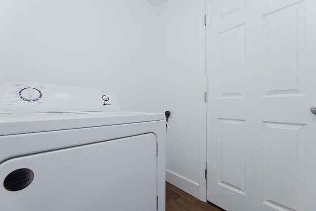 laundry area featuring washer / dryer and dark wood-style floors