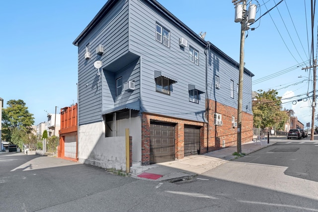 view of building exterior with a garage