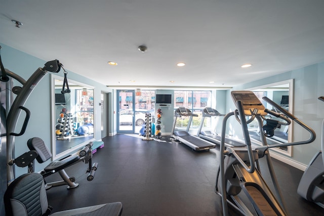 exercise room featuring recessed lighting and baseboards