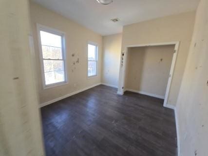 interior space with dark wood-type flooring