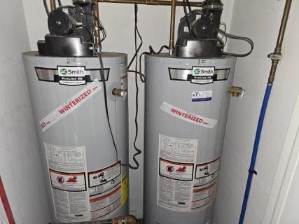 529 Communipaw Ave, Jersey City, NJ 07304 - utility room with gas water heater