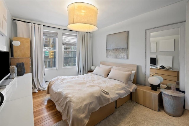 bedroom featuring light hardwood / wood-style flooring