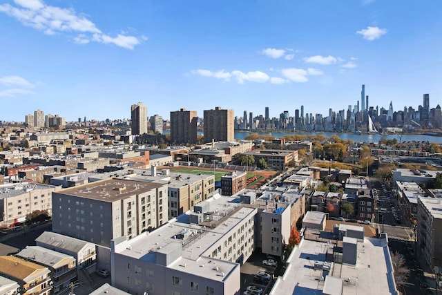 property's view of city featuring a water view