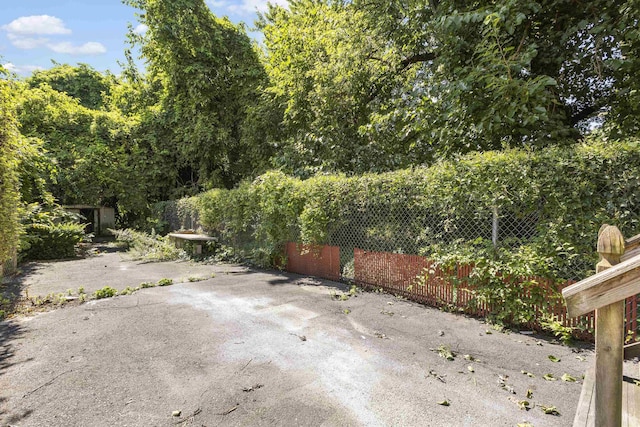 view of patio / terrace featuring fence