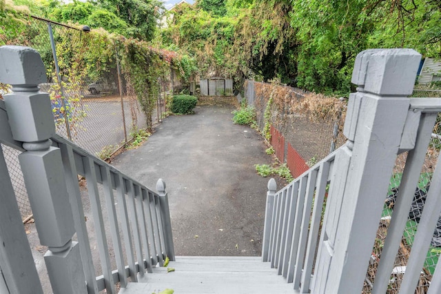 view of gate featuring fence