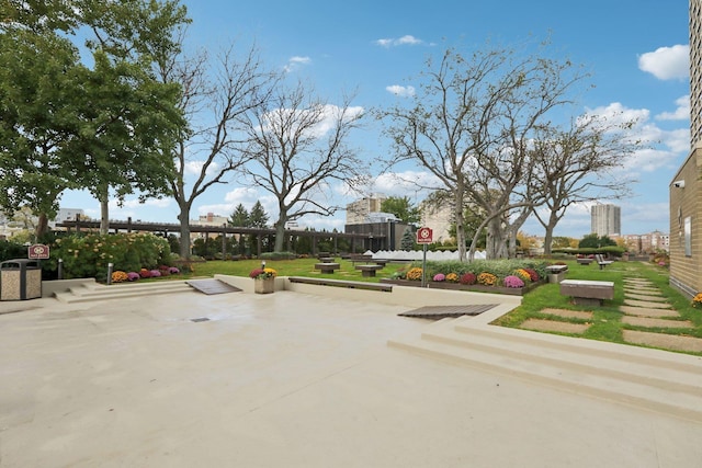 surrounding community with a patio area