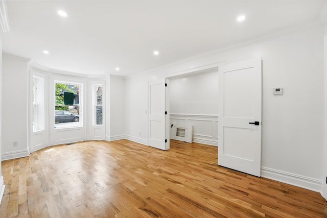 52 Brinkerhoff St, Jersey City, NJ 07304 - unfurnished room with crown molding, light wood-style floors, and recessed lighting