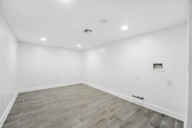 52 Brinkerhoff St, Jersey City, NJ 07304 - empty room with a smoke detector, wood finished floors, and recessed lighting