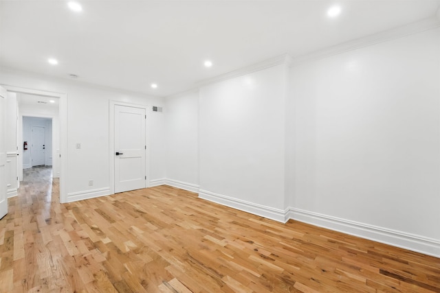 52 Brinkerhoff St, Jersey City, NJ 07304 - unfurnished room featuring light wood-style flooring, recessed lighting, and crown molding