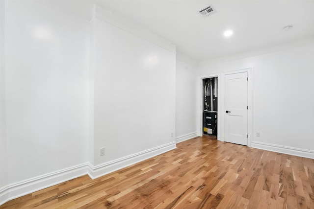 52 Brinkerhoff St, Jersey City, NJ 07304 - empty room with light wood finished floors and baseboards