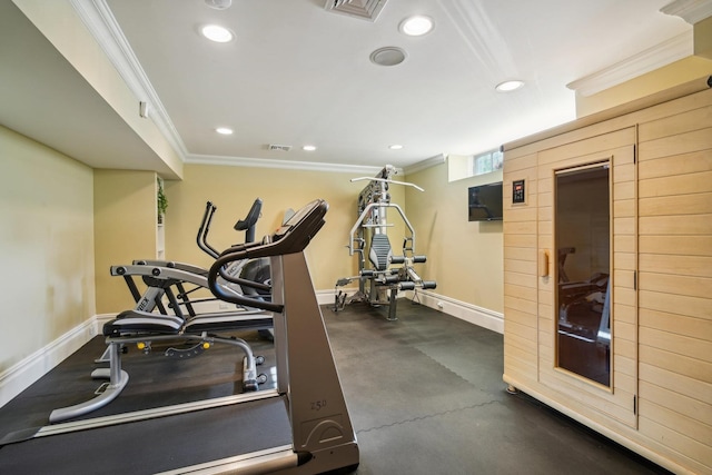 exercise room featuring ornamental molding, recessed lighting, visible vents, and baseboards