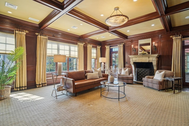 interior space with coffered ceiling, beam ceiling, and visible vents