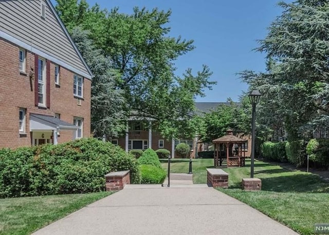 605 Grove St Unit A011, Clifton, NJ 07013 - view of community featuring a gazebo and a lawn