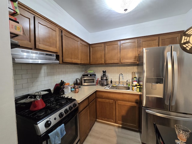 605 Grove St Unit A011, Clifton, NJ 07013 - kitchen featuring stainless steel appliances, under cabinet range hood, a sink, and decorative backsplash
