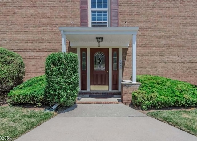 605 Grove St Unit A011, Clifton, NJ 07013 - view of exterior entry with brick siding