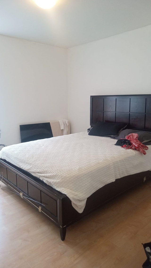 bedroom featuring light hardwood / wood-style flooring