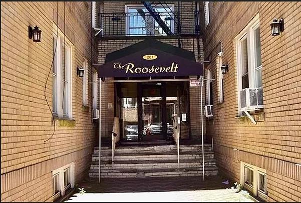 201 45th St Unit E4, Union City, NJ 07087 - doorway to property with brick siding and french doors
