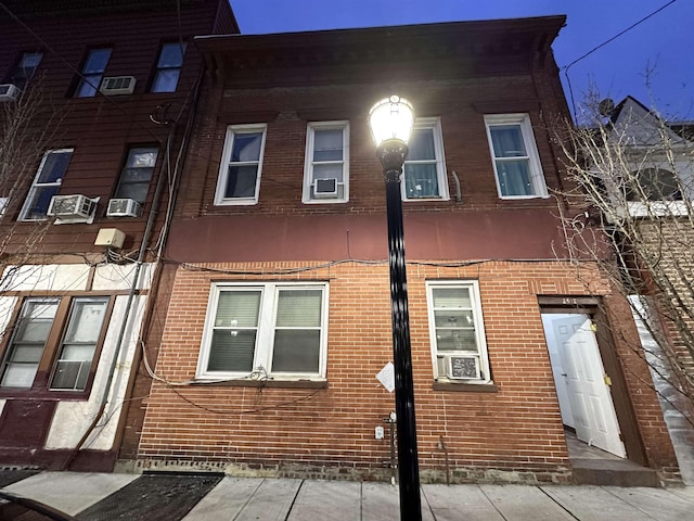 view of home's exterior with brick siding