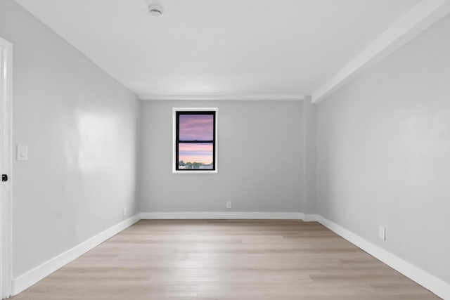 1225 Kennedy Blvd Unit 5A, Bayonne, NJ 07002 - spare room featuring a smoke detector, light wood-style flooring, and baseboards
