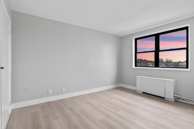 1225 Kennedy Blvd Unit 5A, Bayonne, NJ 07002 - unfurnished room with light wood-style flooring and baseboards