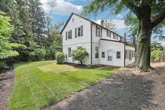 24 Tuers Pl, Montclair, NJ 07043 - view of property exterior featuring a chimney and a yard