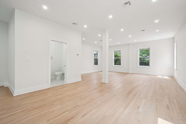 24 Tuers Pl, Montclair, NJ 07043 - unfurnished room featuring light wood-style floors, recessed lighting, and decorative columns