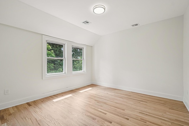 24 Tuers Pl, Montclair, NJ 07043 - empty room featuring light wood finished floors and lofted ceiling